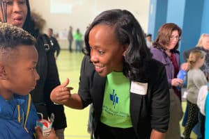 Two Rivers administrator speaking with student